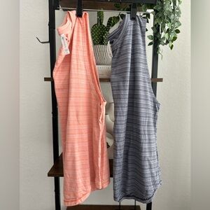 2! Women’s Athleta tanks size medium. Orange and‎ navy. Price is for both tanks.